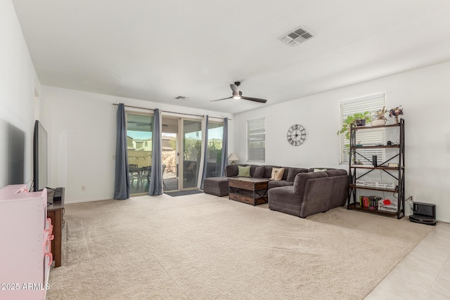 living room featuring ceiling fan