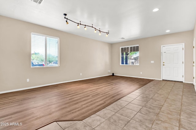 209 E Diamond Trl, San Tan Valley, AZ 85143 - unfurnished room featuring track lighting, wood finished floors, recessed lighting, and baseboards