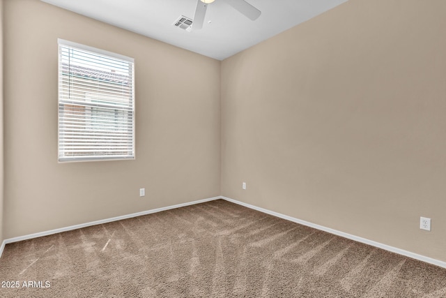 209 E Diamond Trl, San Tan Valley, AZ 85143 - spare room featuring carpet floors, baseboards, and ceiling fan