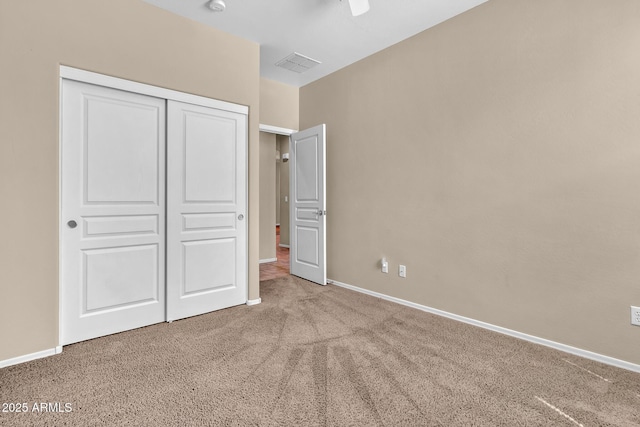 209 E Diamond Trl, San Tan Valley, AZ 85143 - unfurnished bedroom featuring carpet flooring, a closet, baseboards, and a ceiling fan