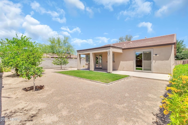 209 E Diamond Trl, San Tan Valley, AZ 85143 - rear view of house featuring stucco siding and a patio area