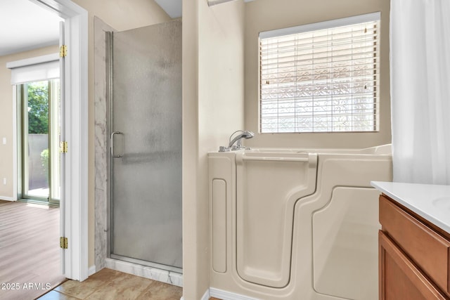 209 E Diamond Trl, San Tan Valley, AZ 85143 - full bathroom with a stall shower, a bath, and vanity