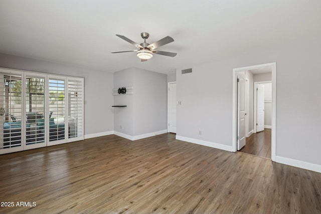 18548 E Parada Cir, Rio Verde, AZ 85263 - interior space featuring wood finished floors, ceiling fan, baseboards, and visible vents
