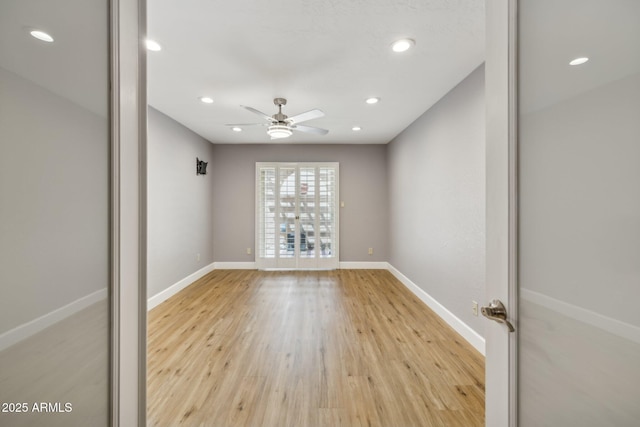 18548 E Parada Cir, Rio Verde, AZ 85263 - spare room with recessed lighting, light wood finished floors, baseboards, and ceiling fan