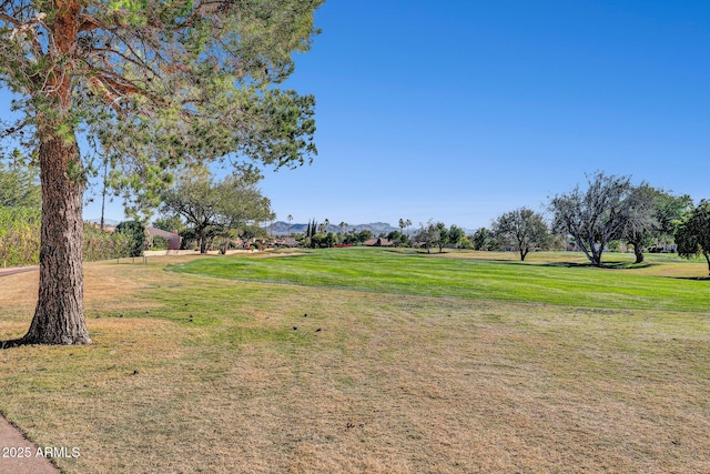 18548 E Parada Cir, Rio Verde, AZ 85263 - view of home's community with a yard, a mountain view, and view of golf course