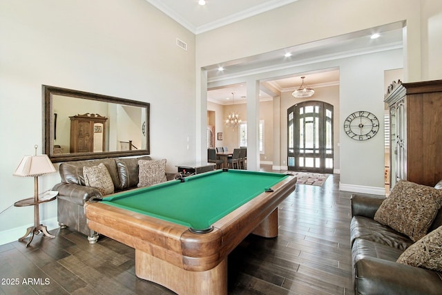 game room featuring crown molding, an inviting chandelier, dark wood-type flooring, and billiards