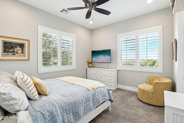 carpeted bedroom with ceiling fan