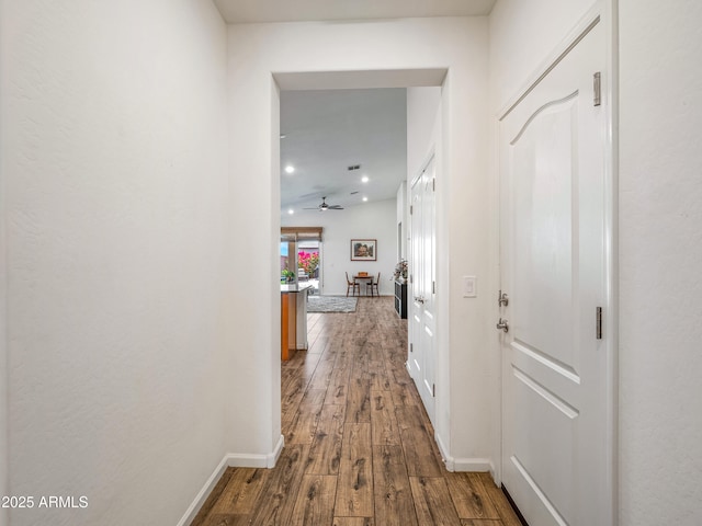 7648 S Thimble Peak, Gold Canyon, AZ 85118 - hall with dark wood finished floors, baseboards, and recessed lighting