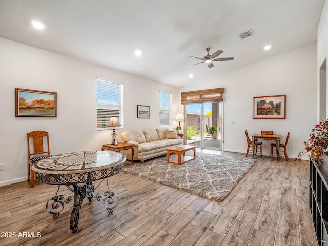 7648 S Thimble Peak, Gold Canyon, AZ 85118 - living room featuring wood finished floors, a ceiling fan, plenty of natural light, recessed lighting, and lofted ceiling