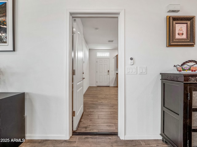 7648 S Thimble Peak, Gold Canyon, AZ 85118 - corridor with wood finished floors and baseboards