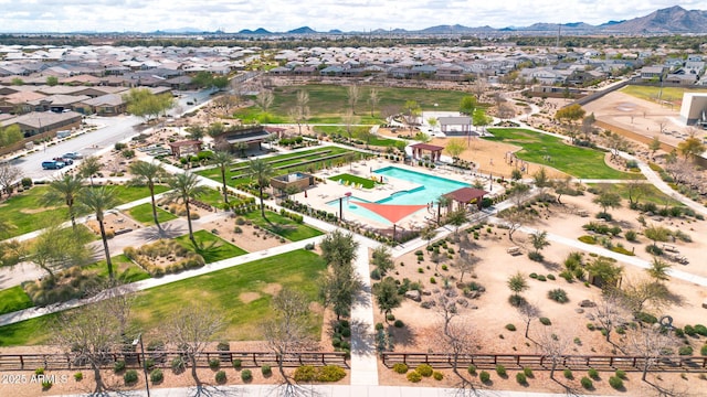 birds eye view of property with a mountain view and a residential view