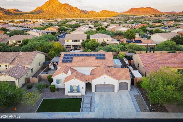 aerial view at dusk with a mountain view