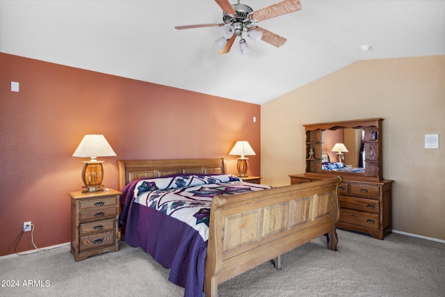 carpeted bedroom featuring lofted ceiling and ceiling fan