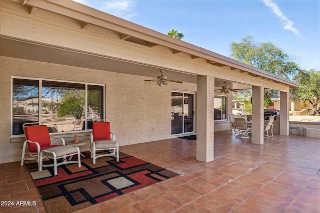 view of patio / terrace featuring ceiling fan