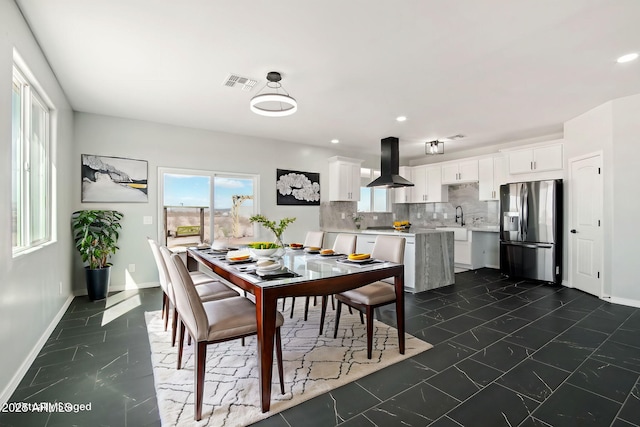 dining space featuring marble finish floor, baseboards, visible vents, and recessed lighting