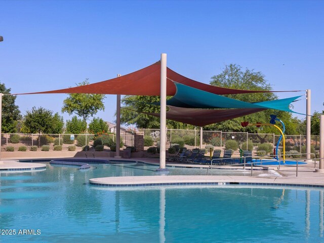 view of pool featuring a jacuzzi