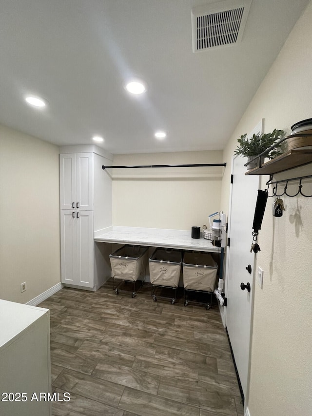 office area featuring recessed lighting, visible vents, and baseboards