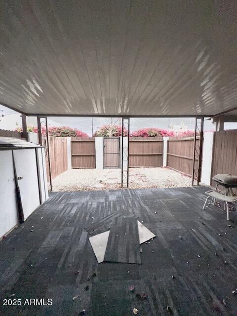 view of patio featuring a fenced backyard