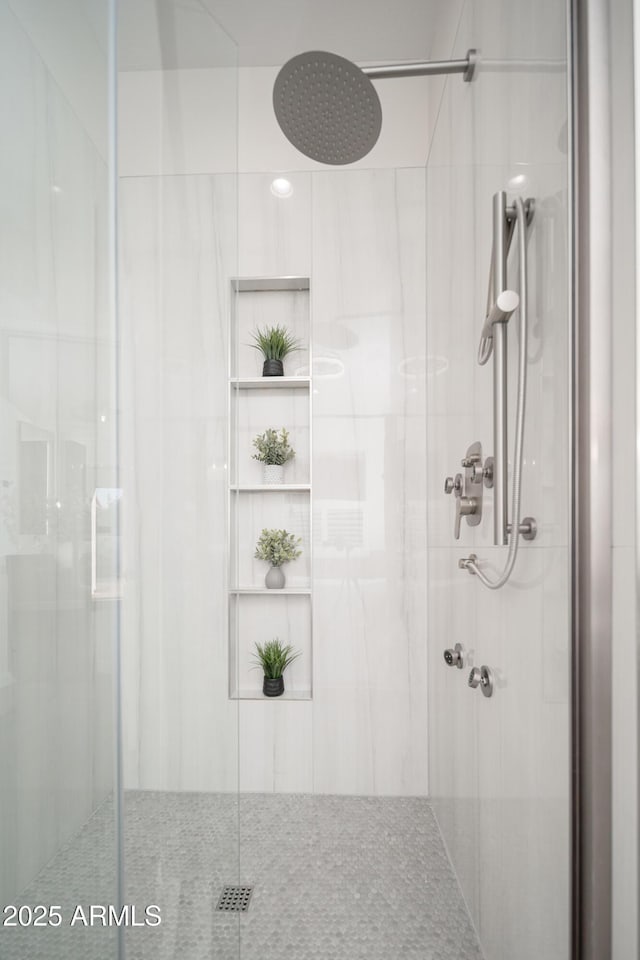 bathroom featuring a shower stall