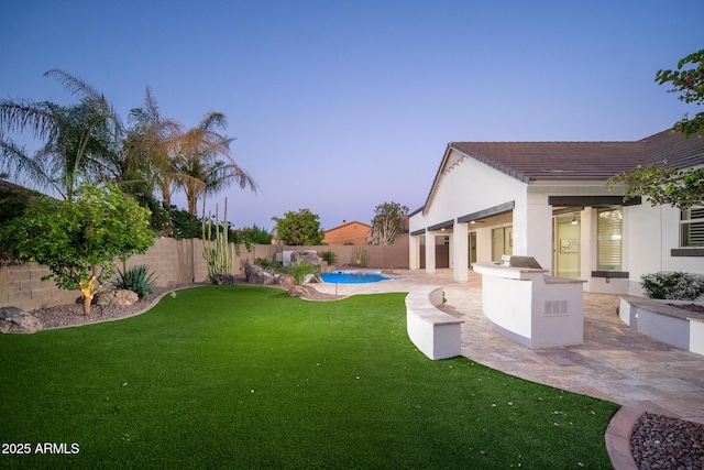 view of yard with a patio and area for grilling