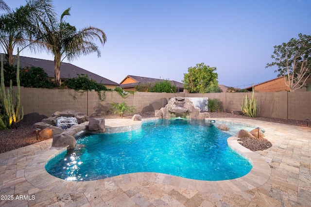 view of pool featuring a fenced backyard and a patio