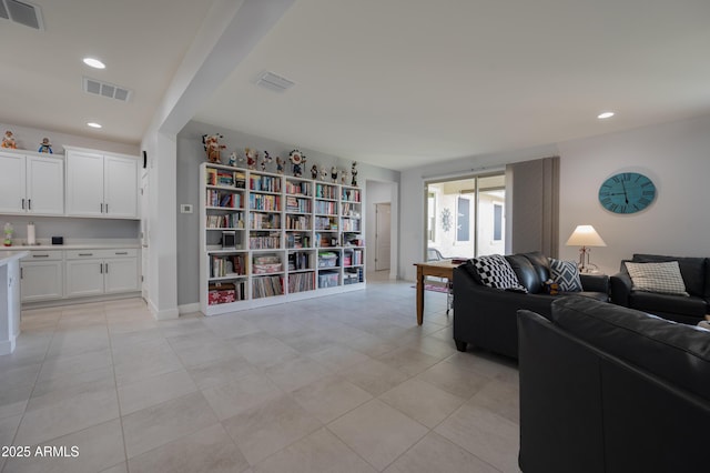 living room with light tile patterned floors