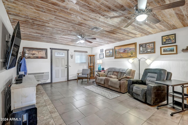 living room featuring ceiling fan, wood ceiling, and a wall mounted AC