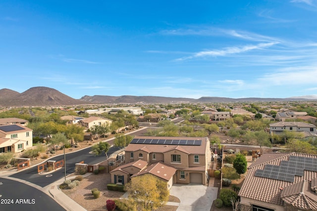 drone / aerial view featuring a mountain view