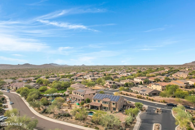 birds eye view of property featuring a mountain view