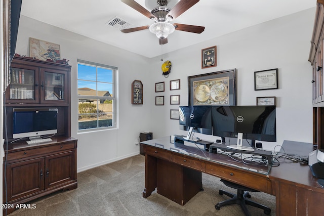 office with carpet flooring and ceiling fan