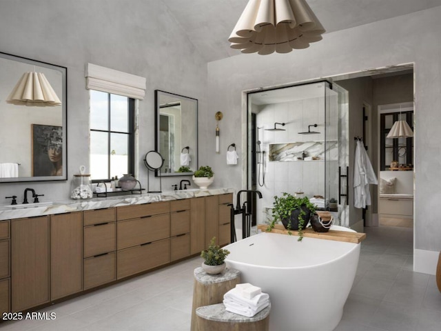 bathroom with double vanity, a soaking tub, a sink, and a shower stall