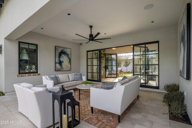 view of patio / terrace featuring ceiling fan and outdoor lounge area