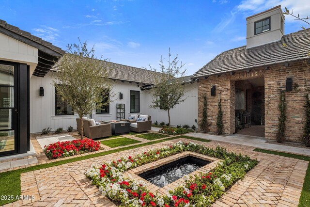 view of patio / terrace with an outdoor hangout area