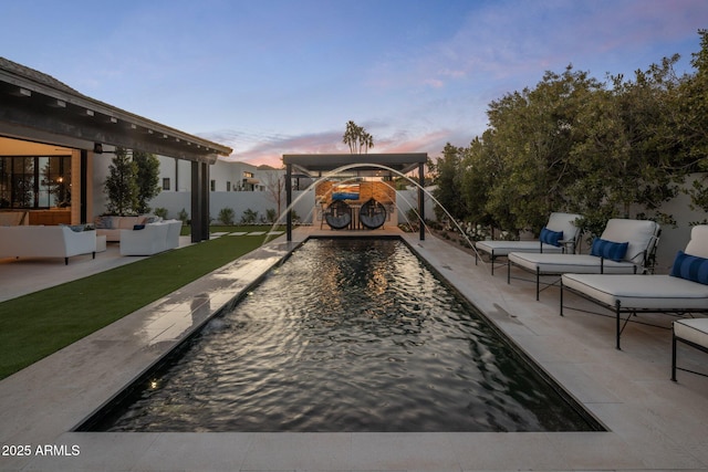 view of home's community with a pool, outdoor lounge area, a patio, and fence