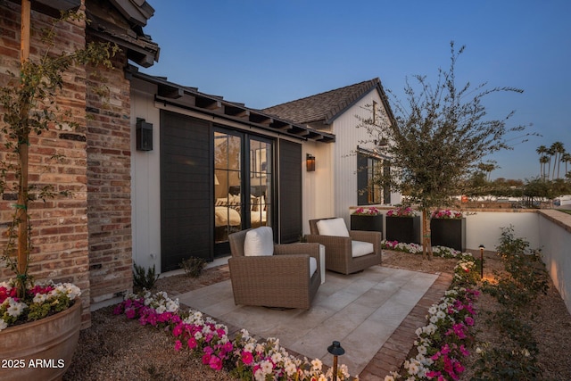 view of patio / terrace with french doors and a fenced backyard