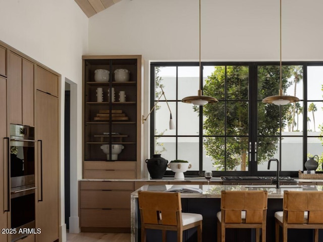 interior space featuring lofted ceiling and a healthy amount of sunlight