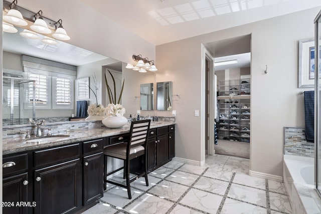 bathroom with a bathing tub and vanity