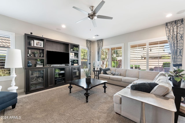 living room with ceiling fan