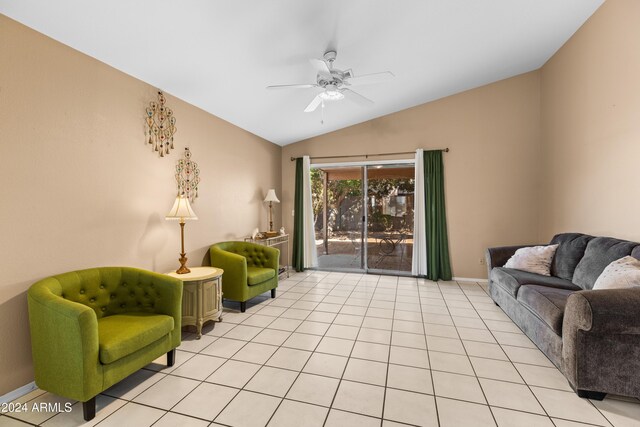 tiled living room featuring vaulted ceiling and ceiling fan