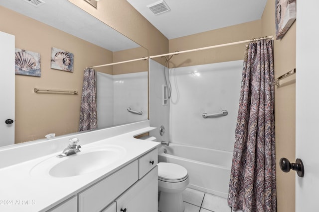 full bathroom with toilet, vanity, tile patterned floors, and shower / tub combo with curtain