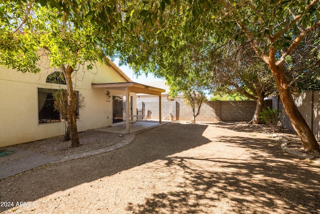 back of property featuring a patio area