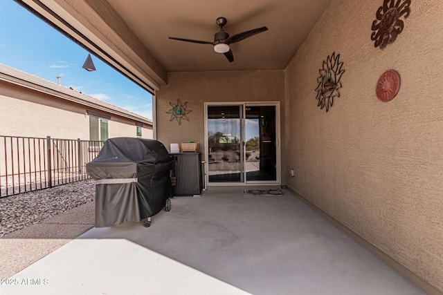 view of patio / terrace featuring ceiling fan and grilling area