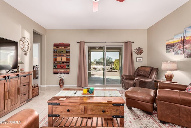 tiled living room featuring ceiling fan