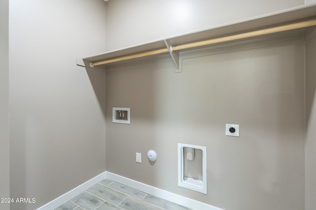 clothes washing area with hookup for an electric dryer and washer hookup