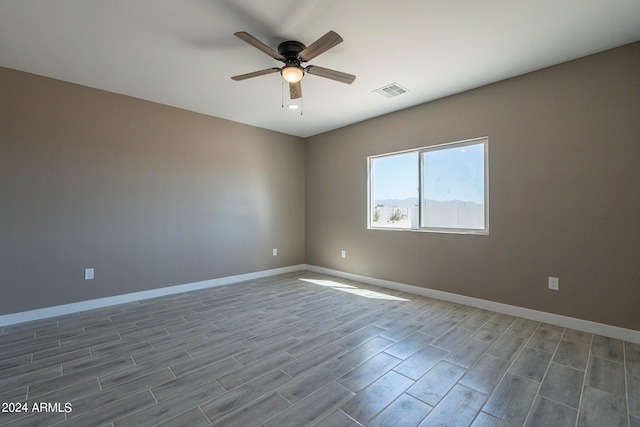 empty room featuring ceiling fan