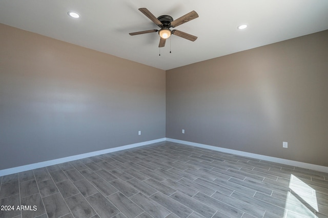 unfurnished room featuring ceiling fan