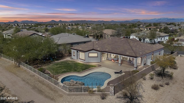 birds eye view of property with a residential view and a mountain view