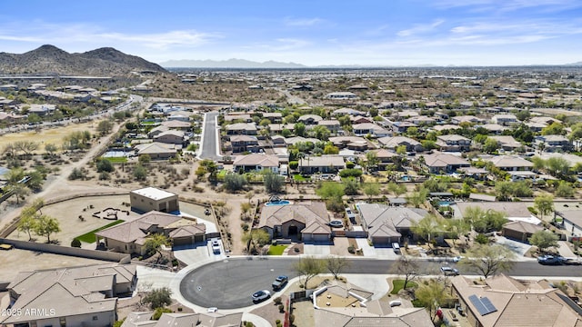 birds eye view of property with a residential view and a mountain view