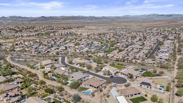 drone / aerial view with a residential view and a mountain view