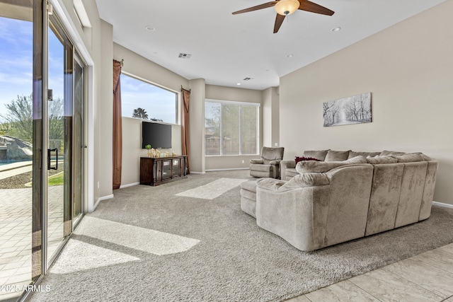 living area featuring ceiling fan, recessed lighting, carpet flooring, visible vents, and baseboards